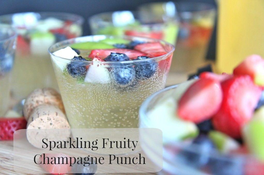  Raise a glass of this sparkling grape champagne punch!