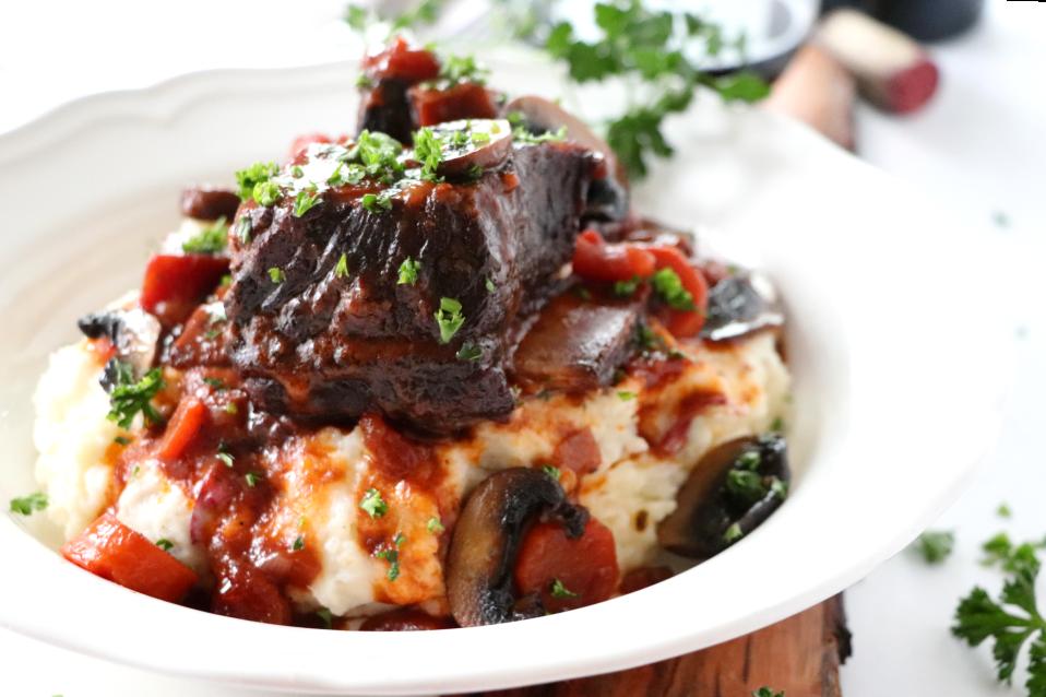  Red wine adds depth and richness to these hearty ribs