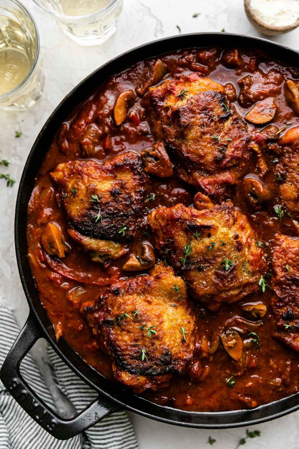  Sautéed chicken simmering in a rich and flavorful tomato sauce