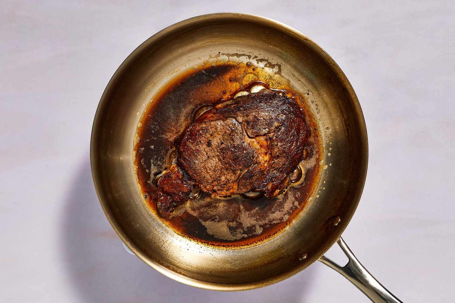 Savor the perfection of a tender steak au poivre with a rich, red wine sauce