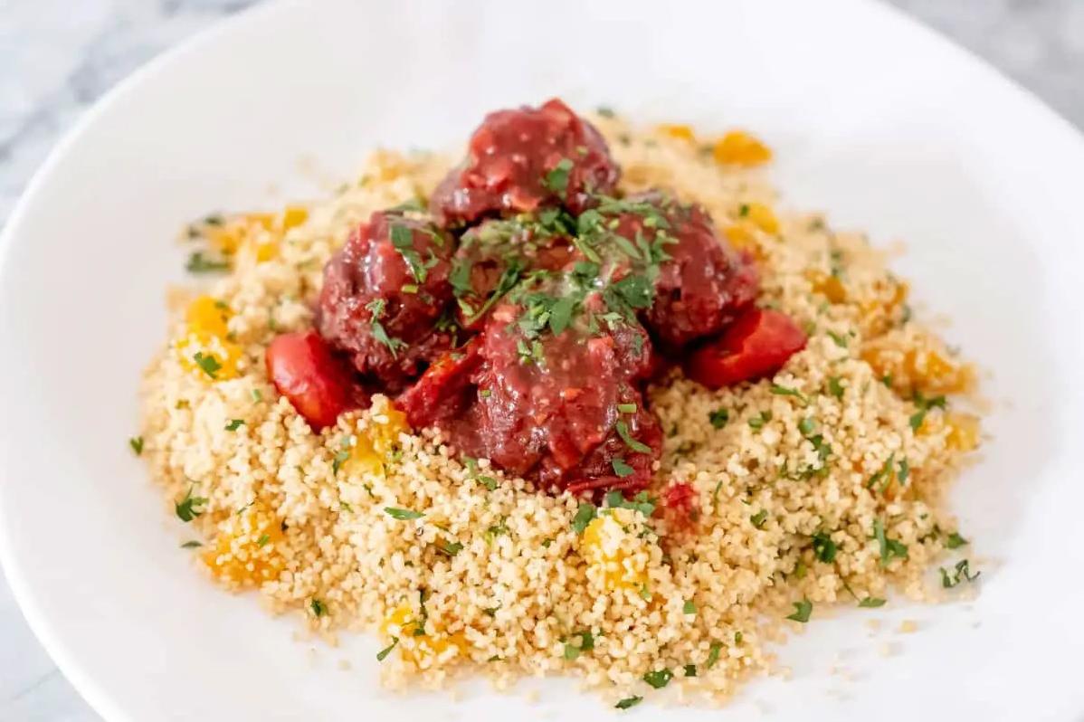  Sizzling-hot, flavorful lamb meatballs smothered in delicious spicy sauce!