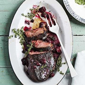  Sizzling sirloins topped with a sweet and tangy red wine berry sauce