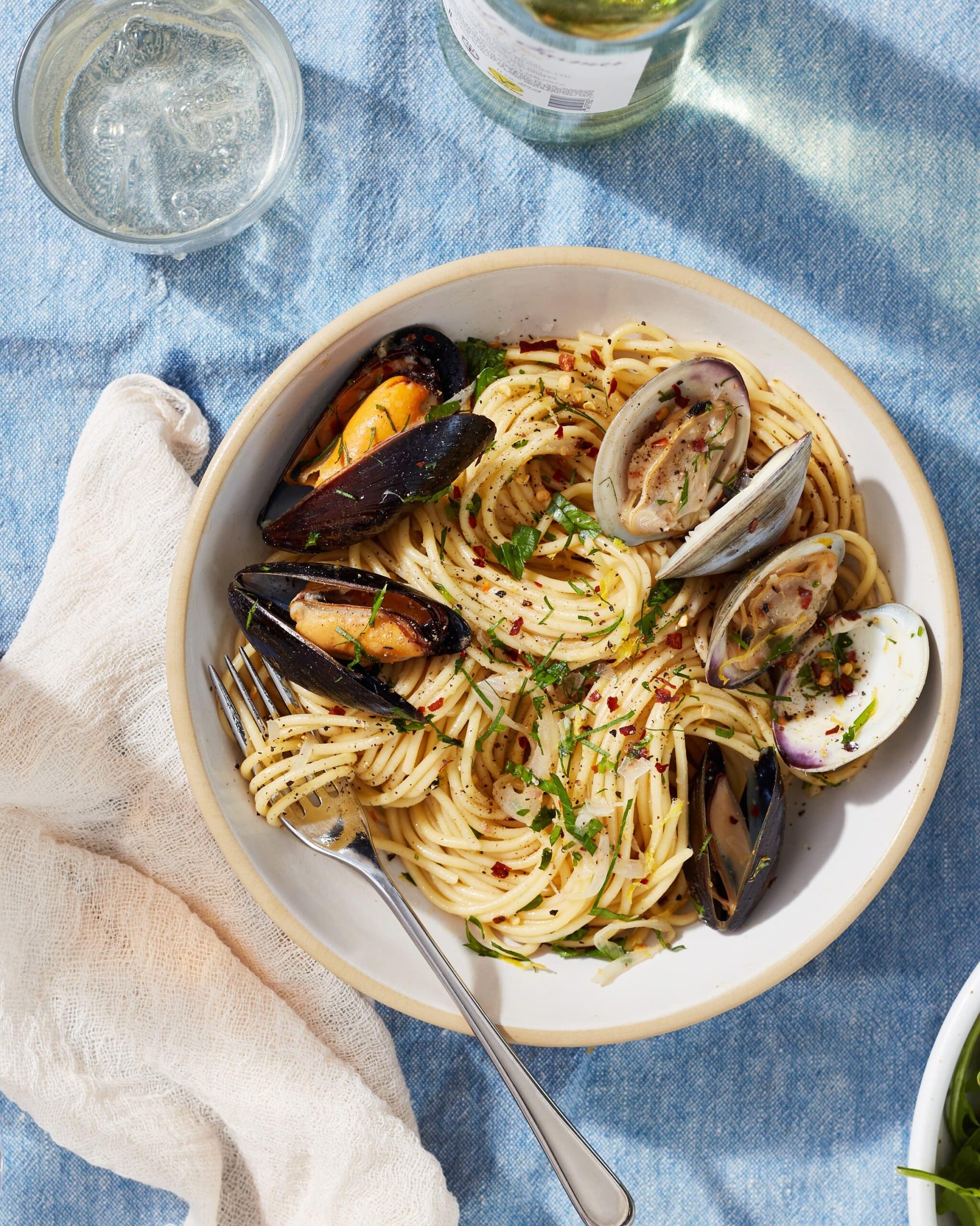  Step up your spaghetti game by adding mussels and white wine into the mix.