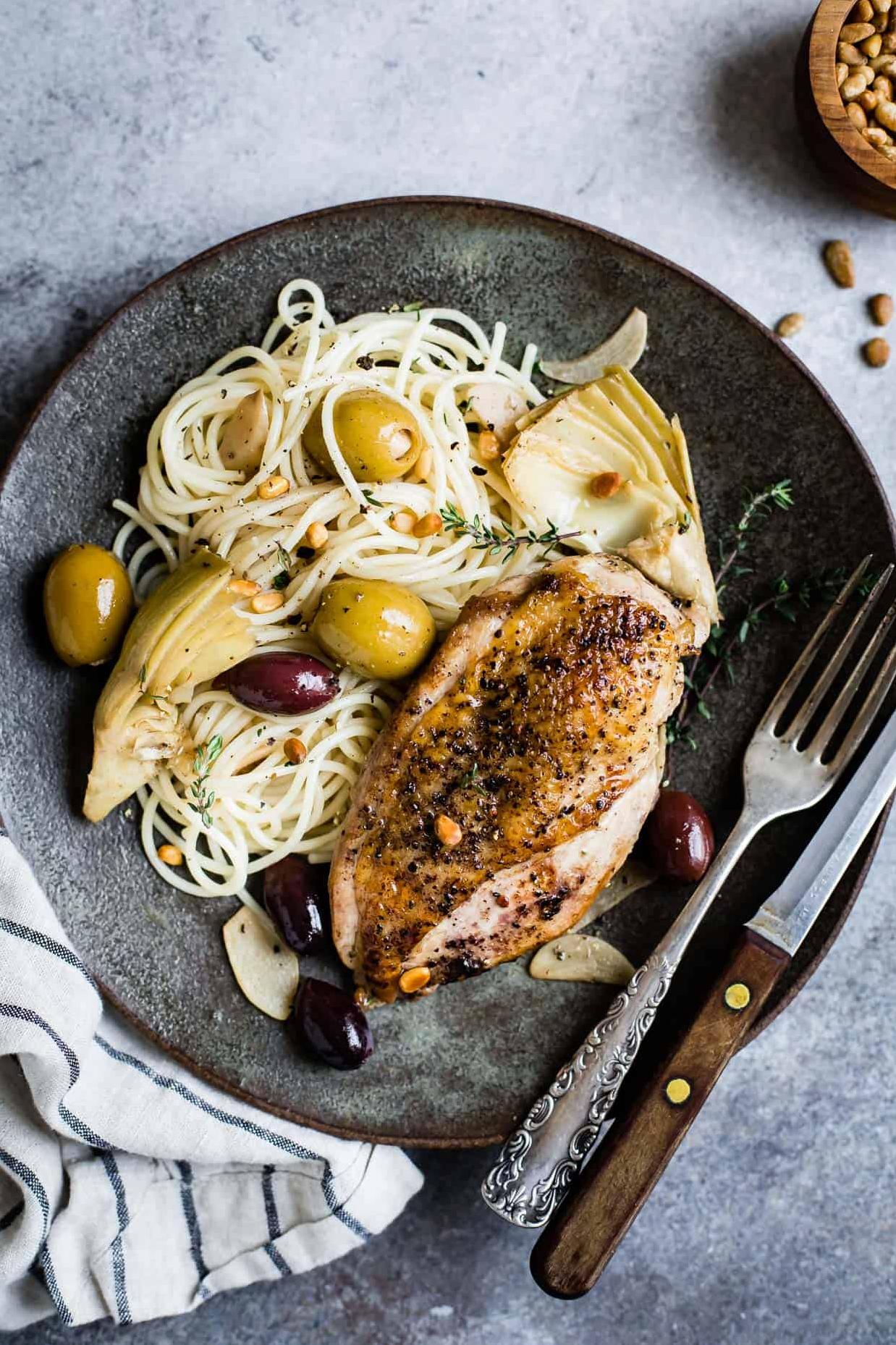  Succulent chicken with a zesty kick from the olives.