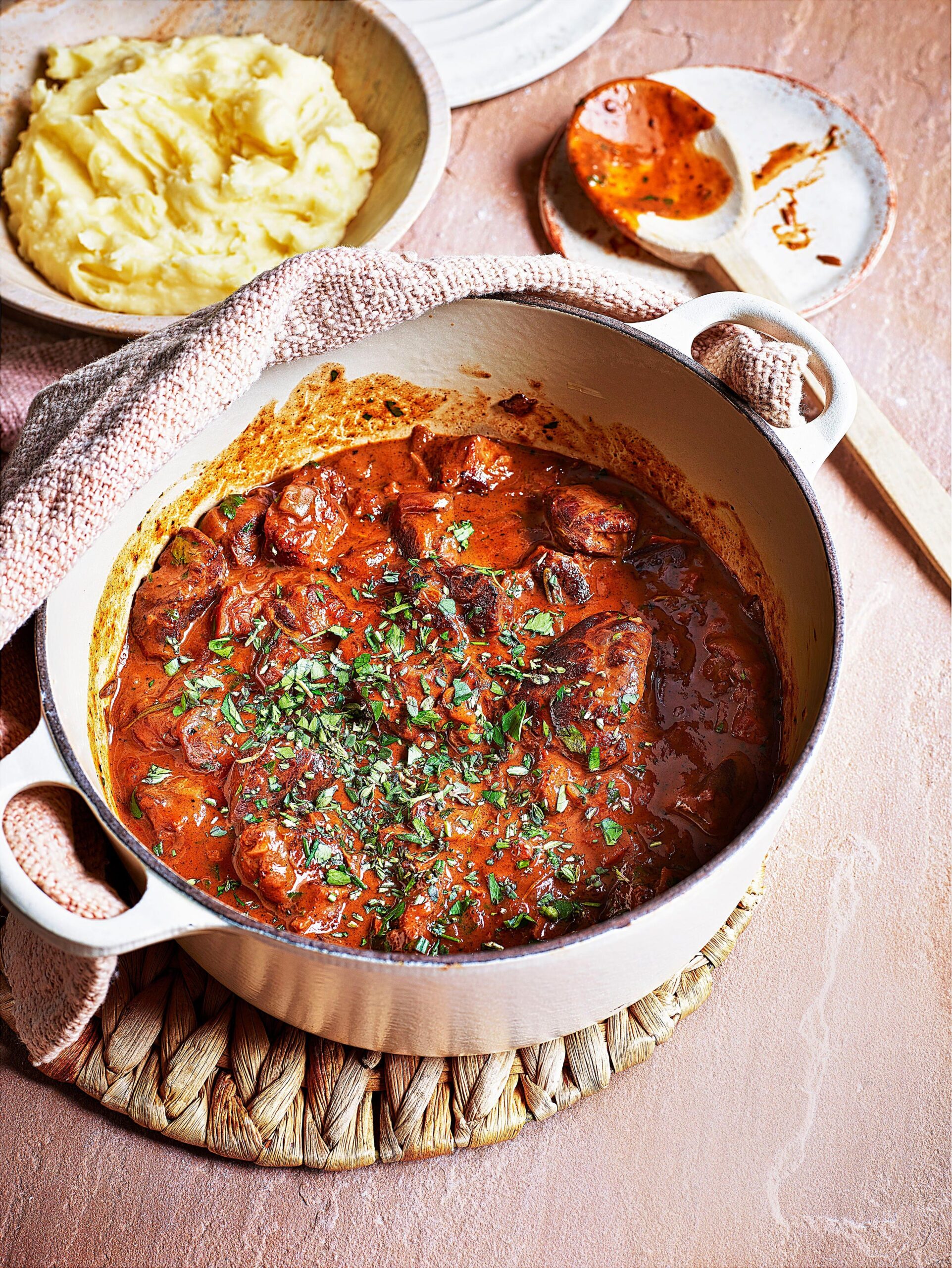  Take your taste buds on a journey with a dish that's both hearty and sophisticated - stewing beef braised in red wine.