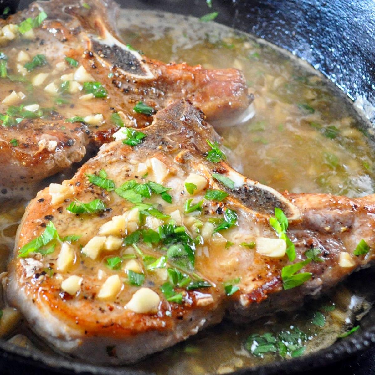  Tender pork chops cooked to perfection with white wine.