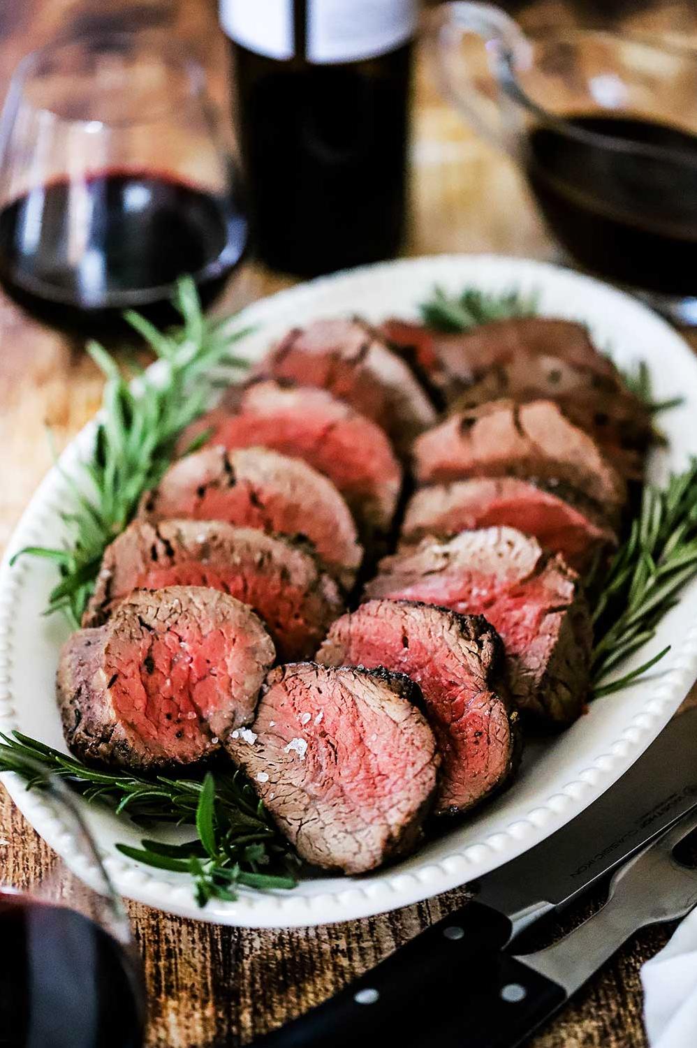  The caramelized crust on the outside of the beef tenderloin is the result of a high heat sear before roasting.