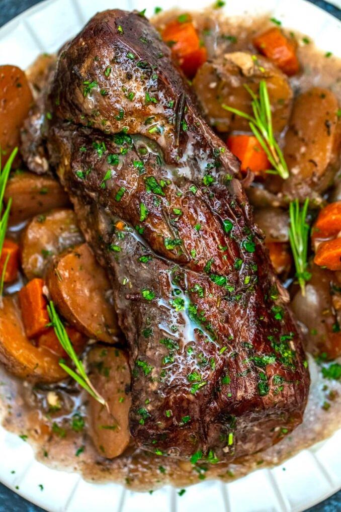  The combination of garlic and wine gives this pot roast a tantalizing flavor that is sure to please even the pickiest eaters.