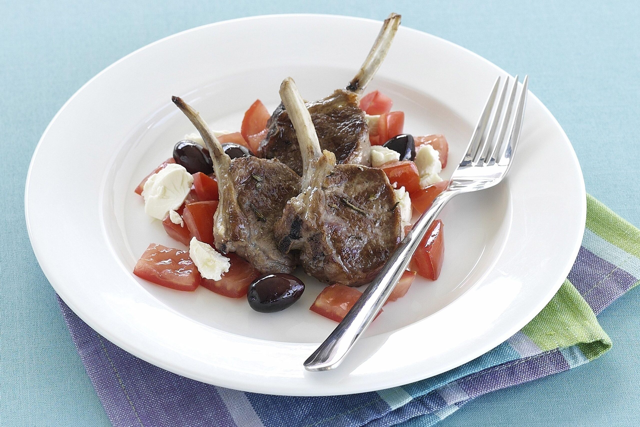  The longer you cook, the richer it gets. Slow-cooking lamb chops with white wine is worth the wait.