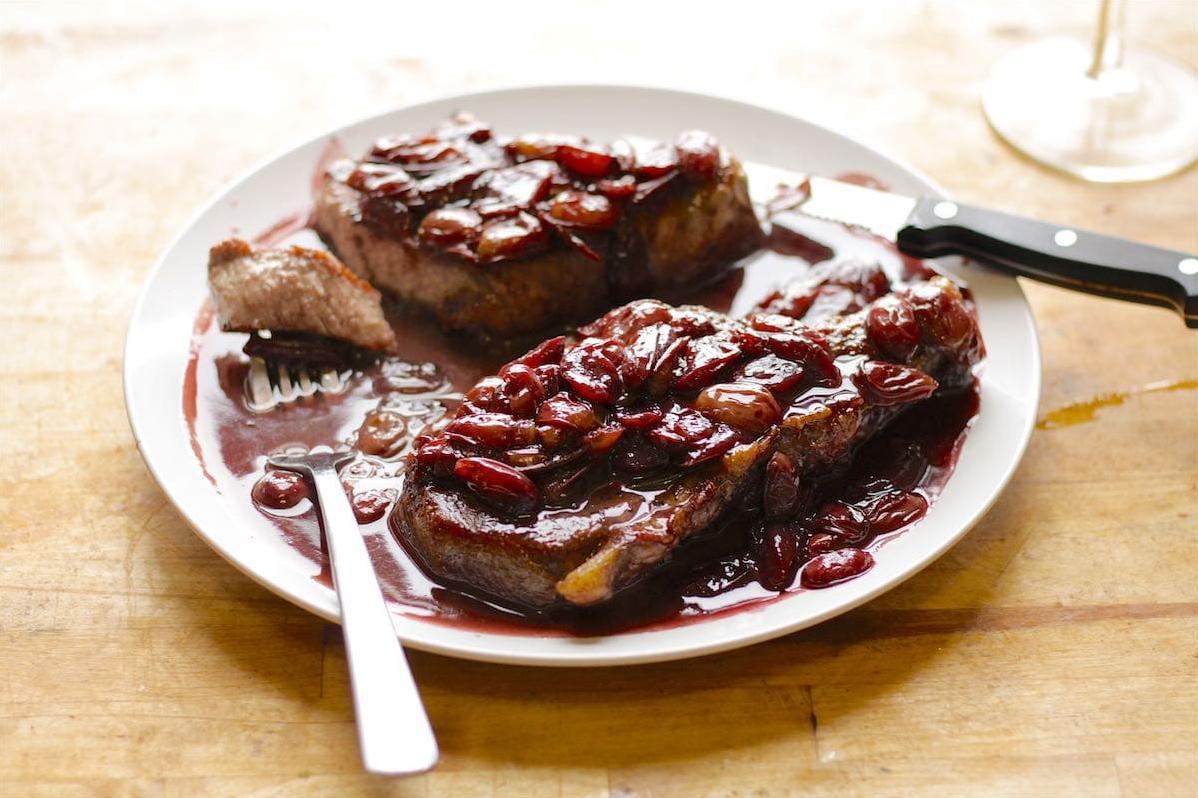  The rich and flavorful sauce made with red wine enhances the pork's taste and texture.