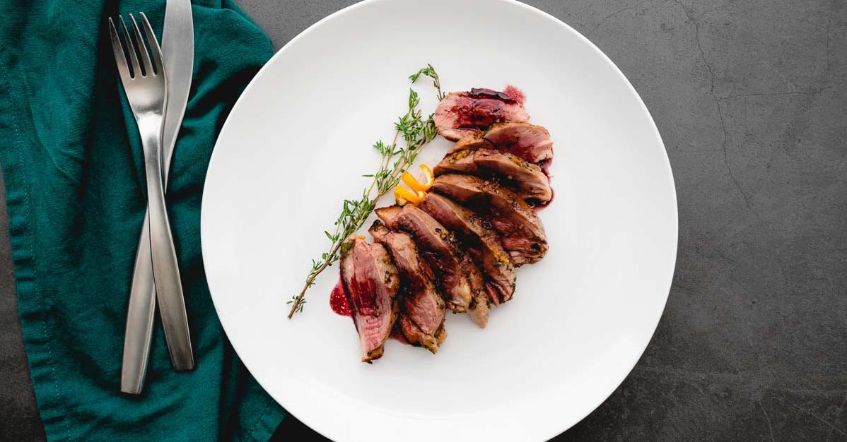  The savory flavors of the duck pair perfectly with the sweet and tangy notes of the reduction.