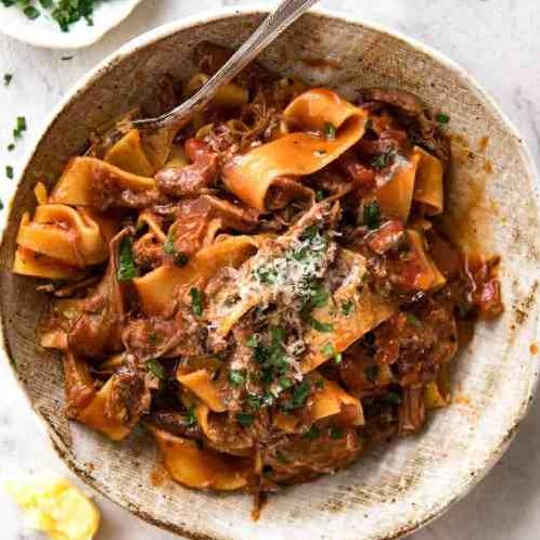  The tender meat in the ragù is slow-cooked in the red wine until it falls apart.