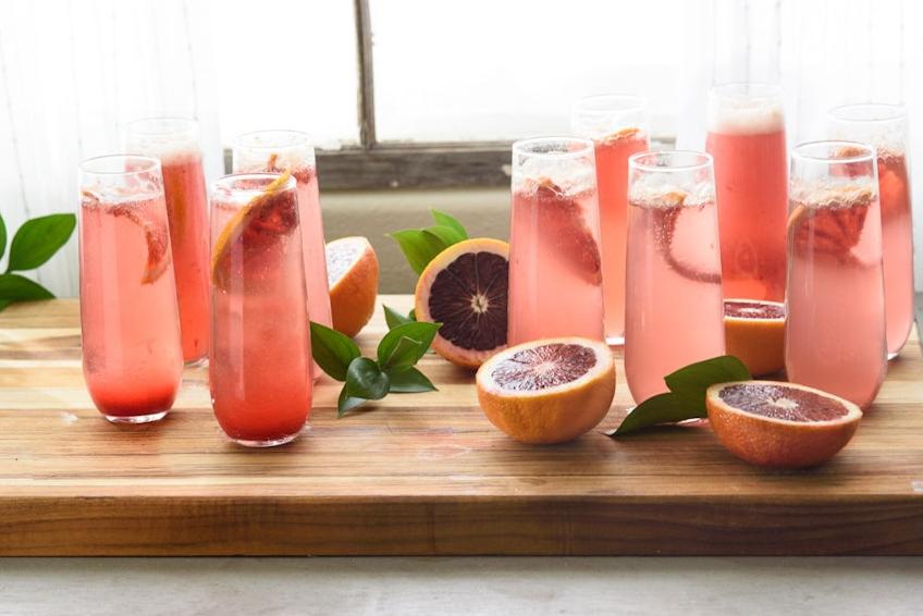  The vibrant color of this cocktail comes from the freshly squeezed blood orange juice.