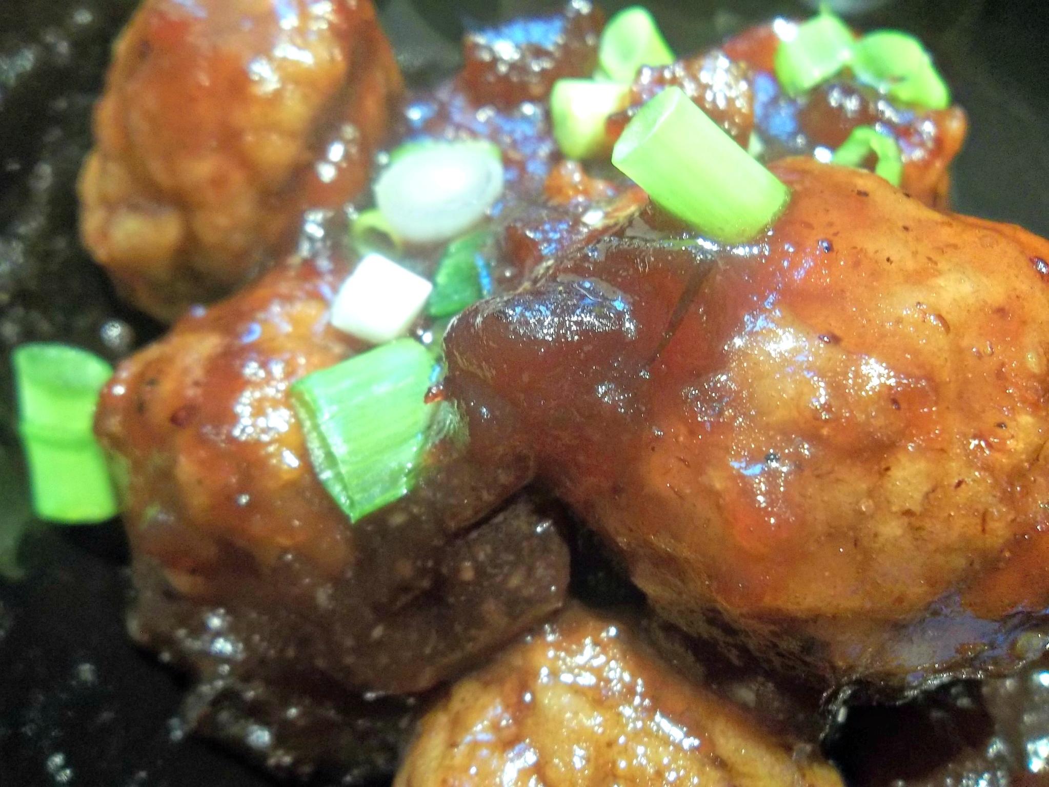  These juicy meatballs are swimming in a savory and sweet cranberry and Pinot Noir sauce.