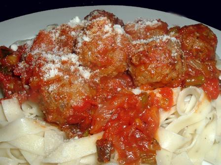  These meatballs are swimming in a delectable pool of tomato-wine sauce.