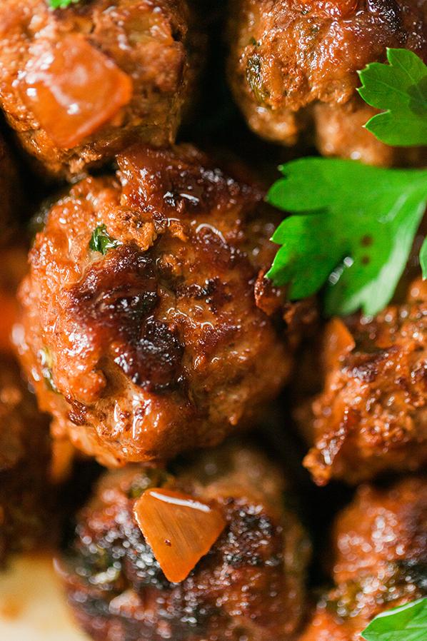 These meatballs have got their heads (and the rest of their bodies) in a lush wine sauce!