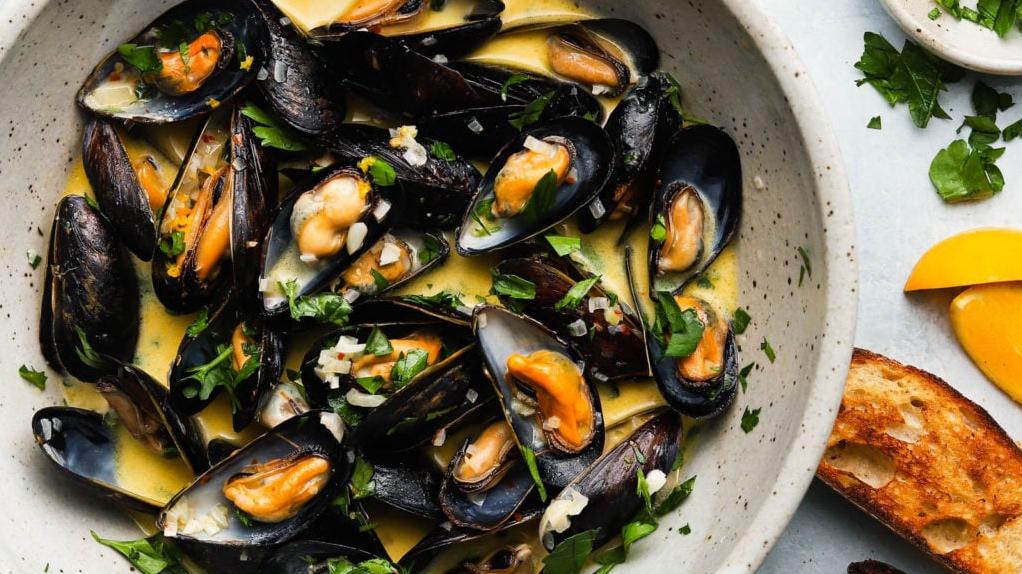  These mussels in white wine and butter are packed with flavor, it's hard to believe they only take 10 minutes to cook.