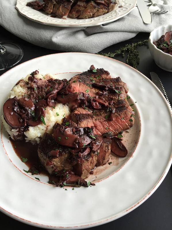  This succulent cut of meat pairs perfectly with a bold and rich red wine reduction.