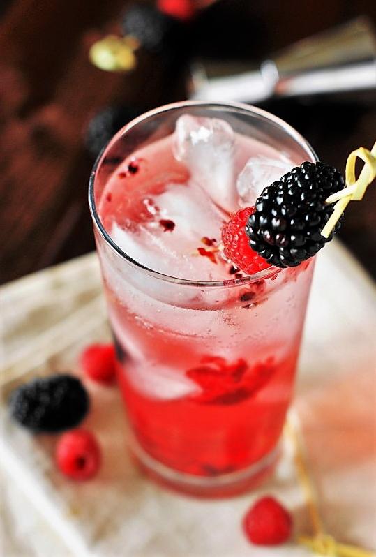  Top off your cocktail with fresh fruits that also serve as a delightful garnish.