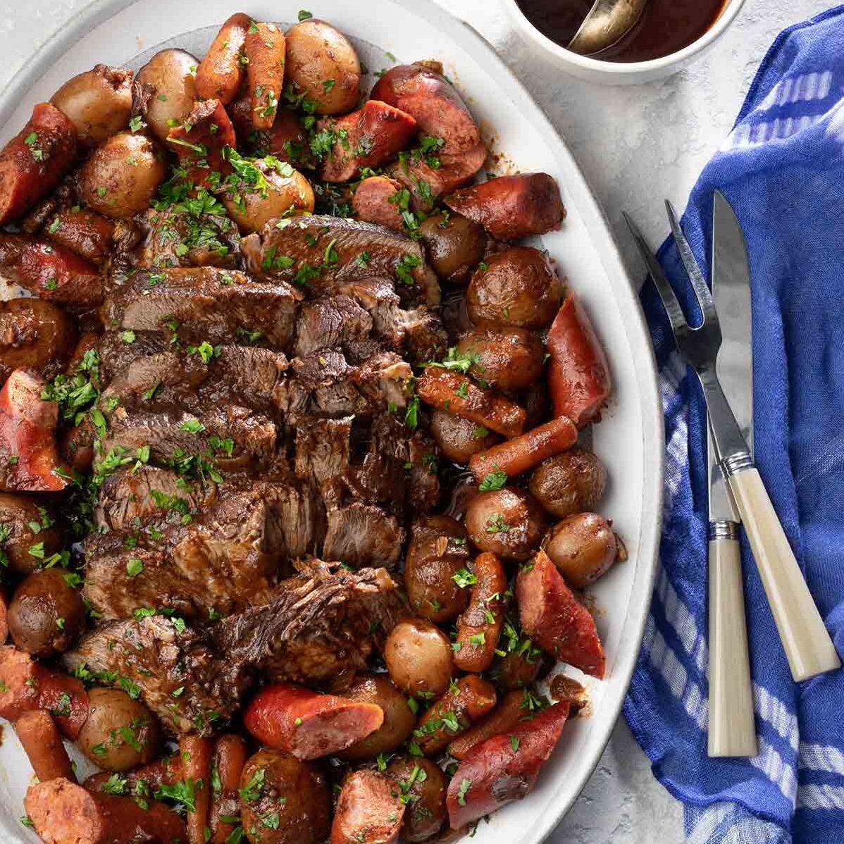  Welcome to the ultimate comfort food: Portuguese Pot Roast in Wine & Garlic!