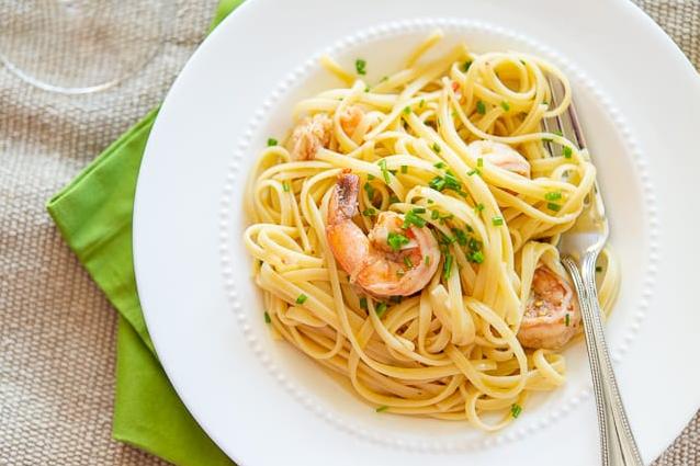  You'll love the balance of the acidity and the sweetness that the tomato and white wine sauce brings to the shrimp